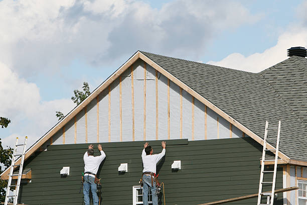 Professional Siding Installation technician working in Dorchester Center, MA